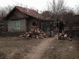 Distributing firewood for a neighbour in the community